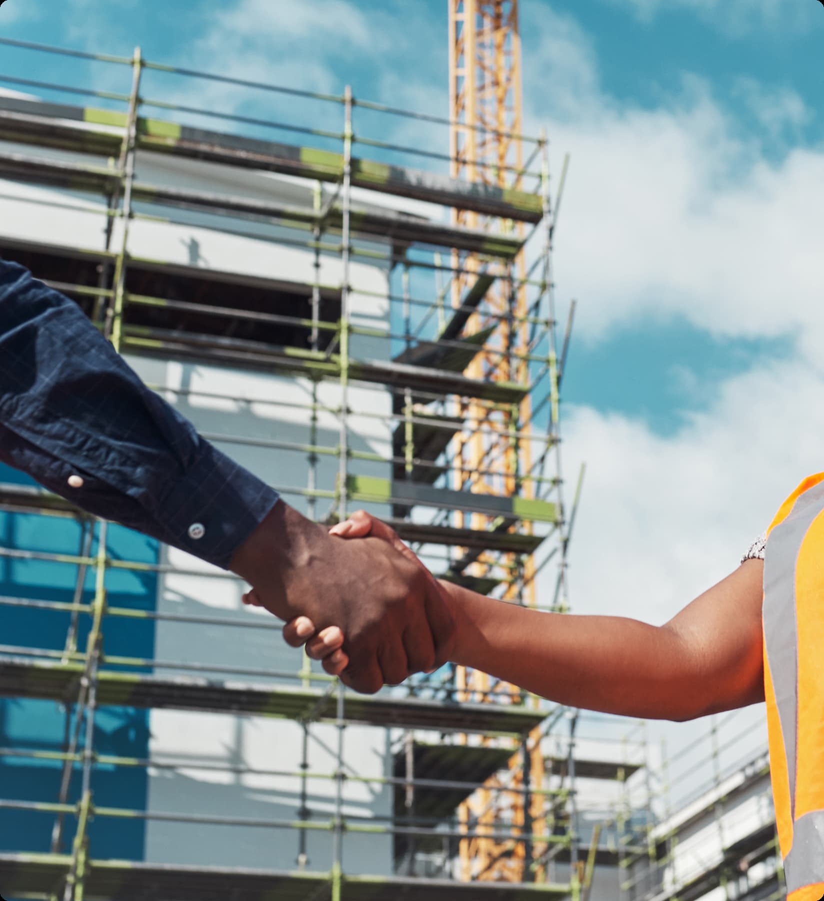 Workers shaking hands